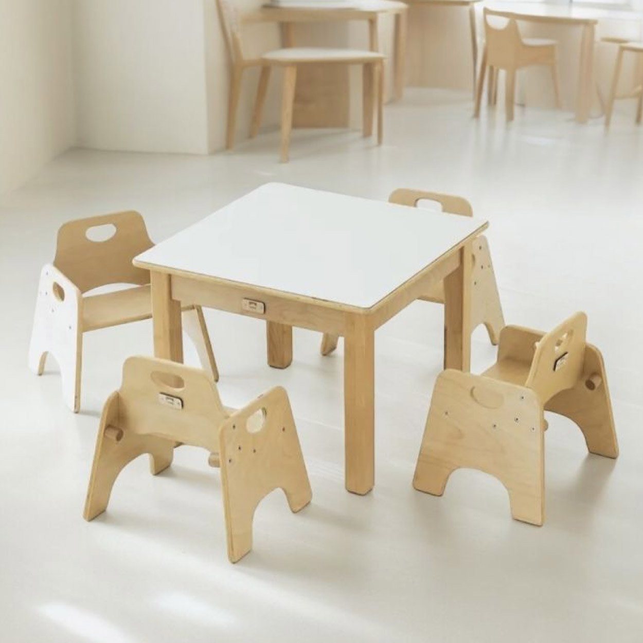 View Our Cosy Essence - Milk White Square Table with a Set of Four Wobbler Chairs